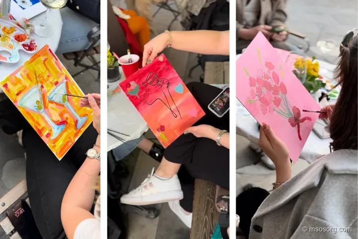 Canvases filling with color as students paint